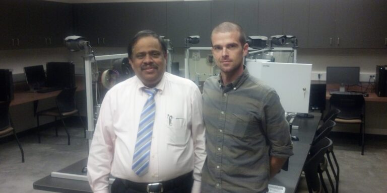 Instructor Training - South Carolina State University in front of security and surveillance technology panels