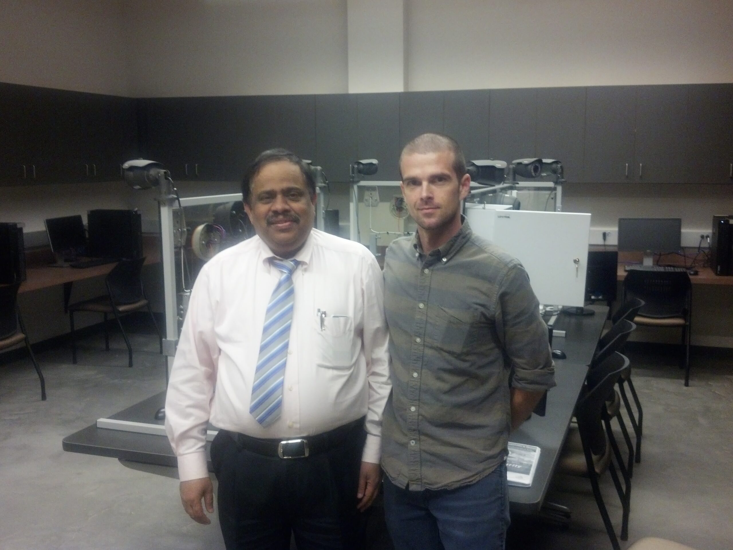 Instructor Training - South Carolina State University in front of security and surveillance technology panels