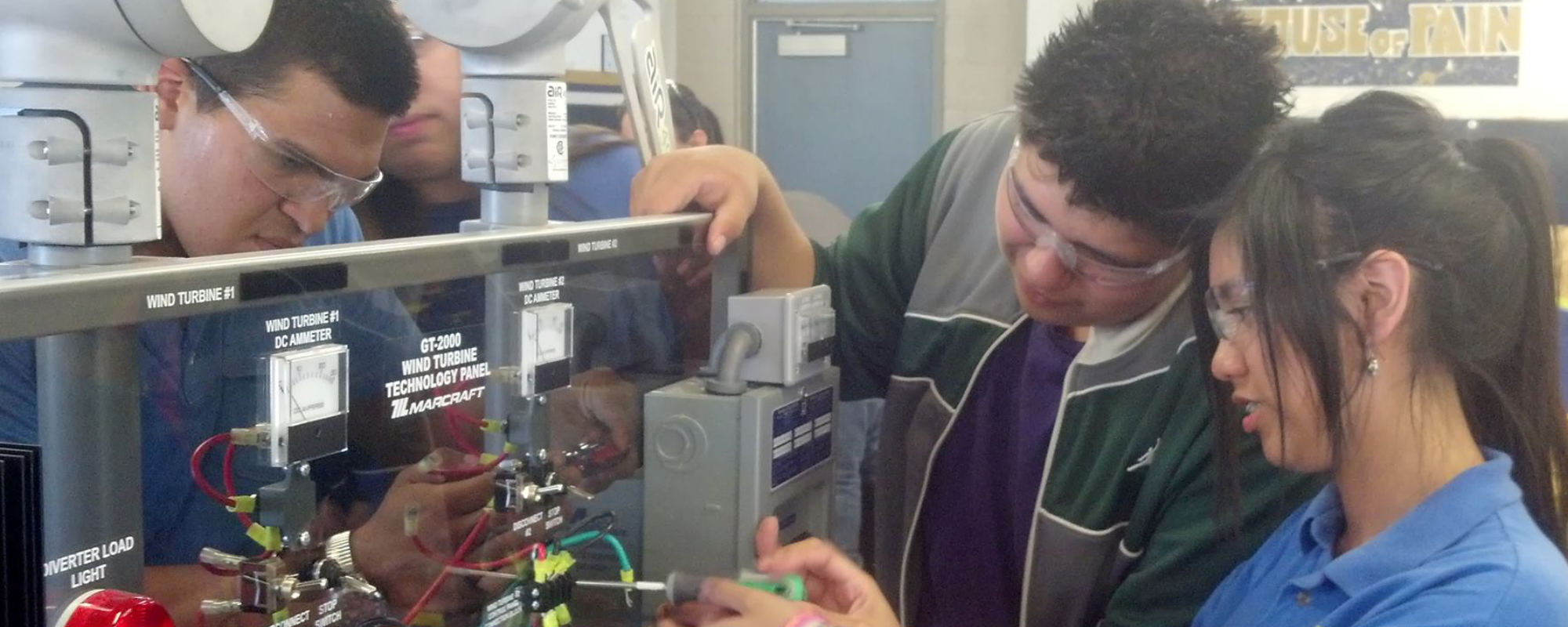 Students working on GT-2000 Wind Turbine Technology Panel