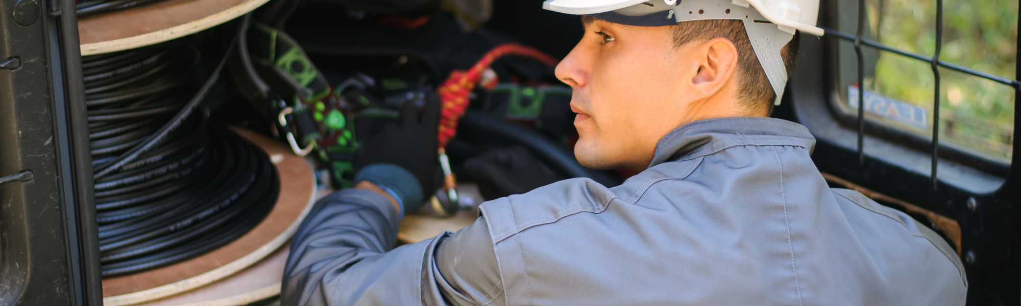 A picture of an installer getting ready to install cabling