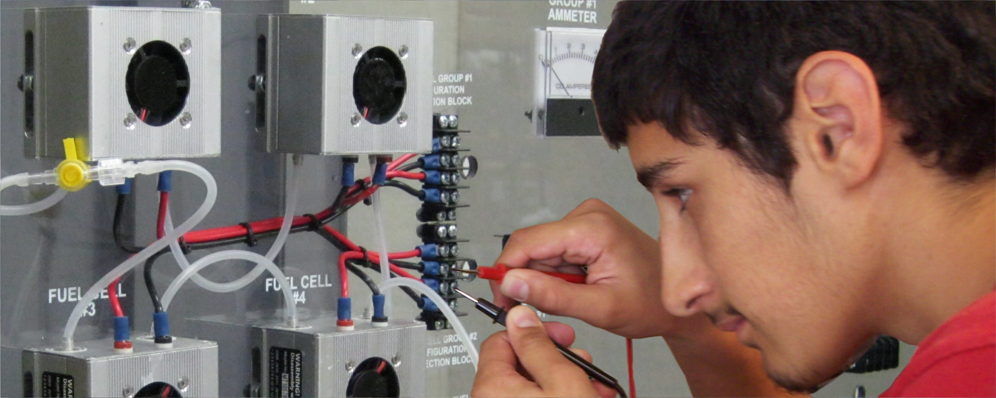 Student learning on the GT-3000 Fuel Cell Training technology panel