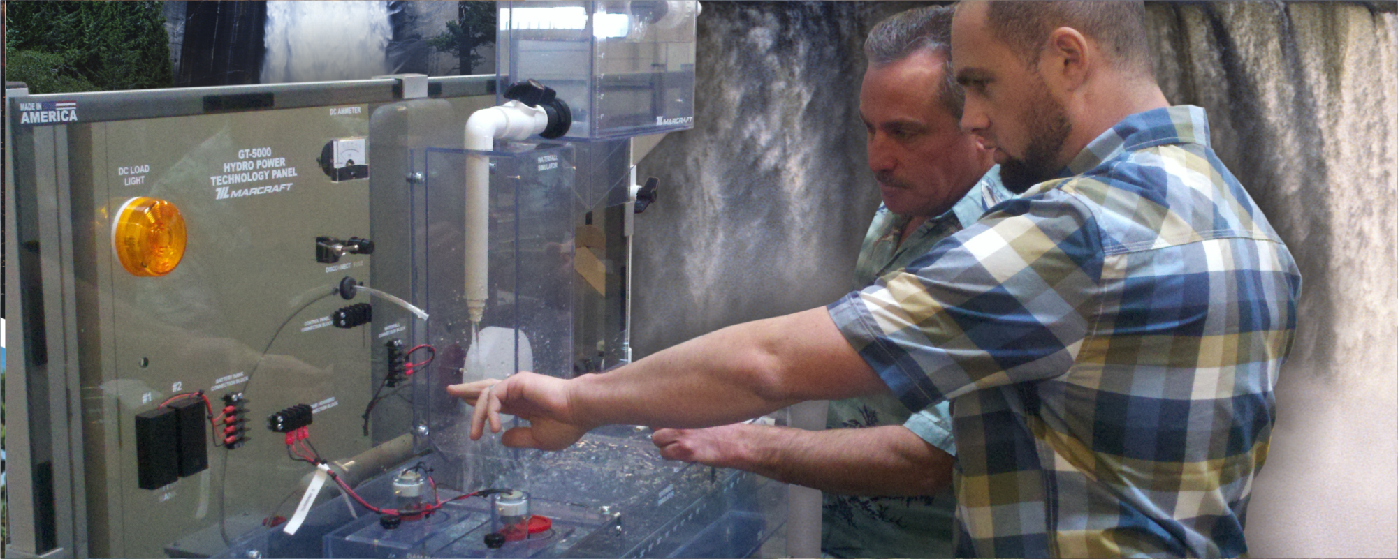 Instructors working on GT-5000 Hydro Power Technology Panel